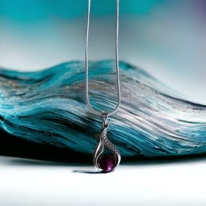 Purple cultured pearl and sterling pendant. NWOT